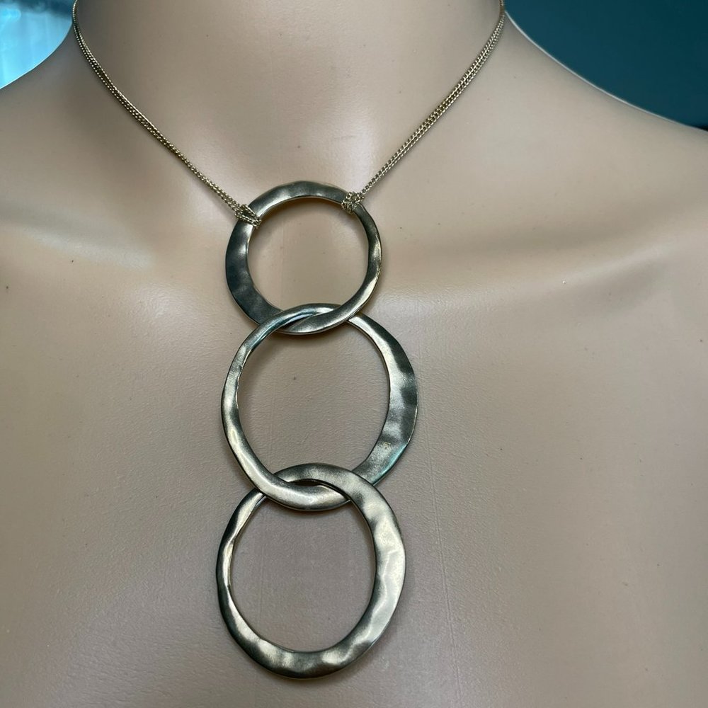 Kenneth Cole bronze necklace with 3 interlocking loops and earings set
